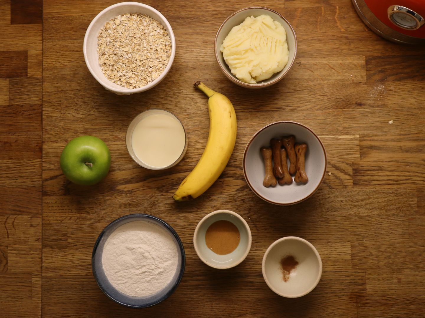 spiced apple cupcake ingredients: an apple, banana, mashed potato, cinnamon , self-raising flour , oats, and milk (unsweetened).